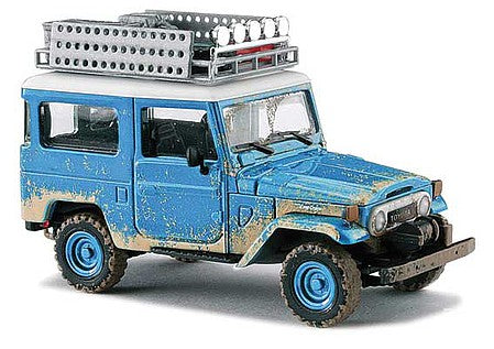 Busch 43023 HO Scale 1960 Toyota Land Cruiser J4 Hardtop SUV with Roof Rack - Assembled -- Weathered, Blue, White