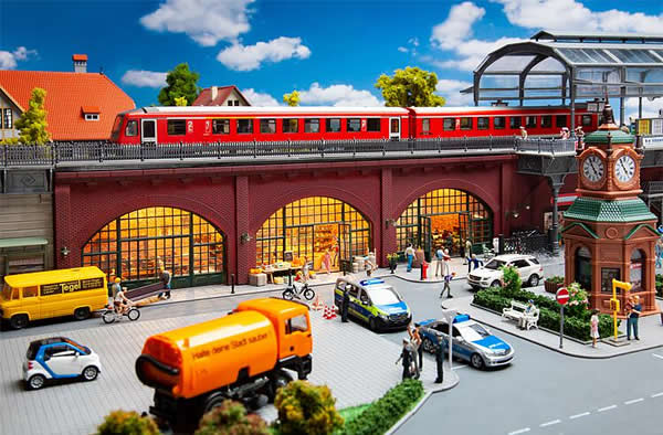 Faller 120571 HO Scale Brick Arcades with Shops, Interiors and Track Bed -- Kit - 14-1/8 x 5-7/16 x 3-13/16" 35.8 x 13.8 x 9.7cm