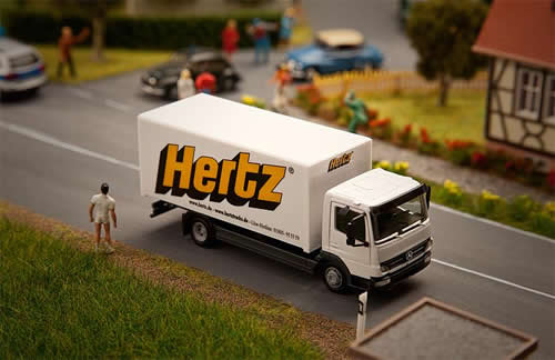 Faller 161560 HO Scale Mercedes-Benz Atego Box Truck - Car System -- Hertz (white, yellow, black)