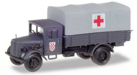Herpa 746076 HO Scale Opel Blitz Low-Side Truck w/Canvas Cover - Assembled -- German Army Medical Corps (gray, red, white, German Lettering)