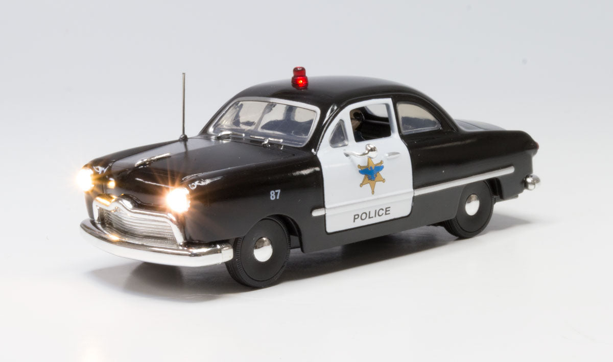 Woodland Scenics 5973 O Scale Police Car - Just Plug(R) Lighted Vehicle -- Black, White