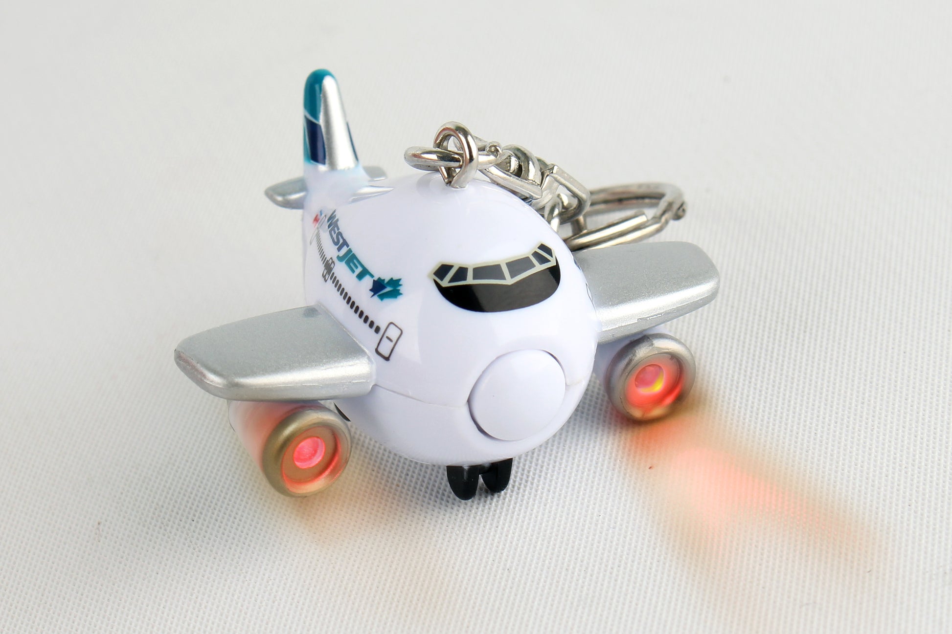 Daron Airplane Keychains W/Light & Sound TT88244-1 Westjet Airplane Keychain W/Light & Sound