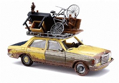 Busch 46858 HO Scale 1977 Mercedes Benz W123 Sedan - Assembled -- With Overloaded Roof Rack, Weathered, Various Colors