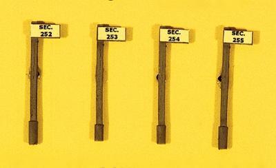 JL Innovative 835 HO Scale Custom Railroad Right-of-Way Signs -- Section Sign Set - Pole Style pkg(4)