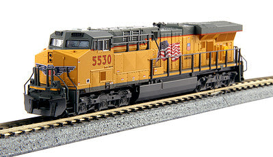 Kato 1768923 N Scale GE ES44AC GEVO - Standard DC -- Union Pacific #5530 (Armour Yellow, gray; U.S. Flag & "Building America" Logo)