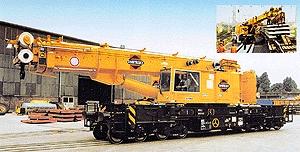 Kibri 16000 HO Scale Maintenance/Work Train Equipment - Heavy Cranes (Nonpowered Plastic Kits) -- 100-Ton Crane w/Telescoping Boom - "Swietelsky" (yellow)