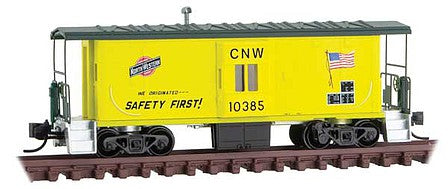 Micro Trains Line 13000280 N Scale Steel Bay Window Caboose - Ready to Run -- Chicago & North Western 10385 (yellow, green, Employee Owned Logo, US Flag)