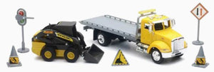 New Ray 16173 1/43 Peterbilt Flatbed Truck w/New Holland L228 Skid Steer Loader (Die Cast)